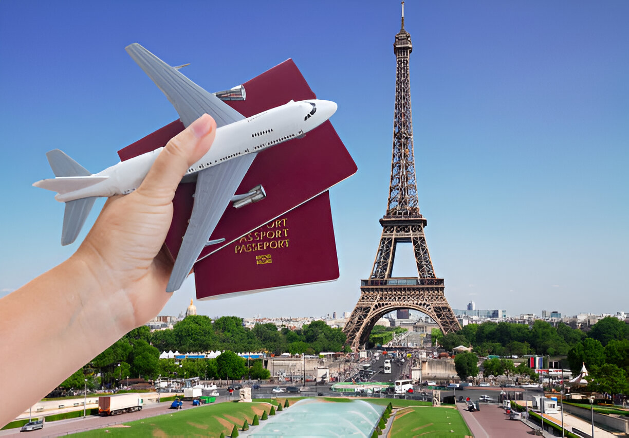 This image visually captures the idea of international travel to France. It features a hand holding passports and a model airplane in the foreground, with the Eiffel Tower prominently displayed in the background, representing Paris as a travel destination. The bright and clear design evokes excitement and the freedom of exploration.